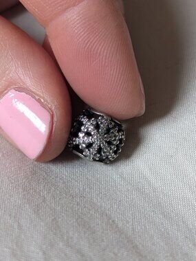 Retired Pandora snowflake charm